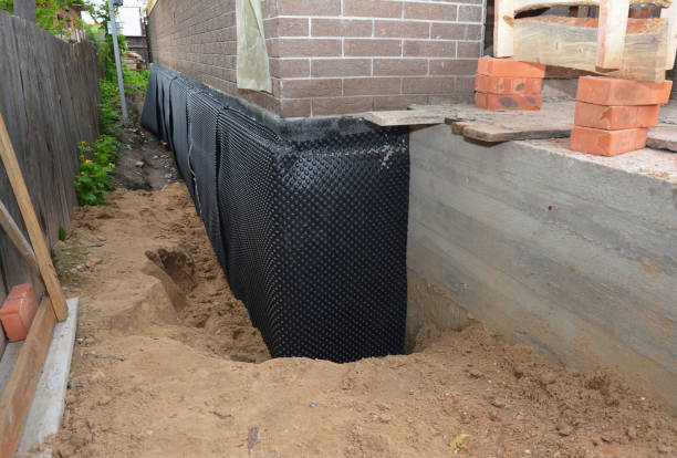 SJ Waterproofing Pros technician performing targeted Vapor Barrier Installation assessment in Thorntown, IN